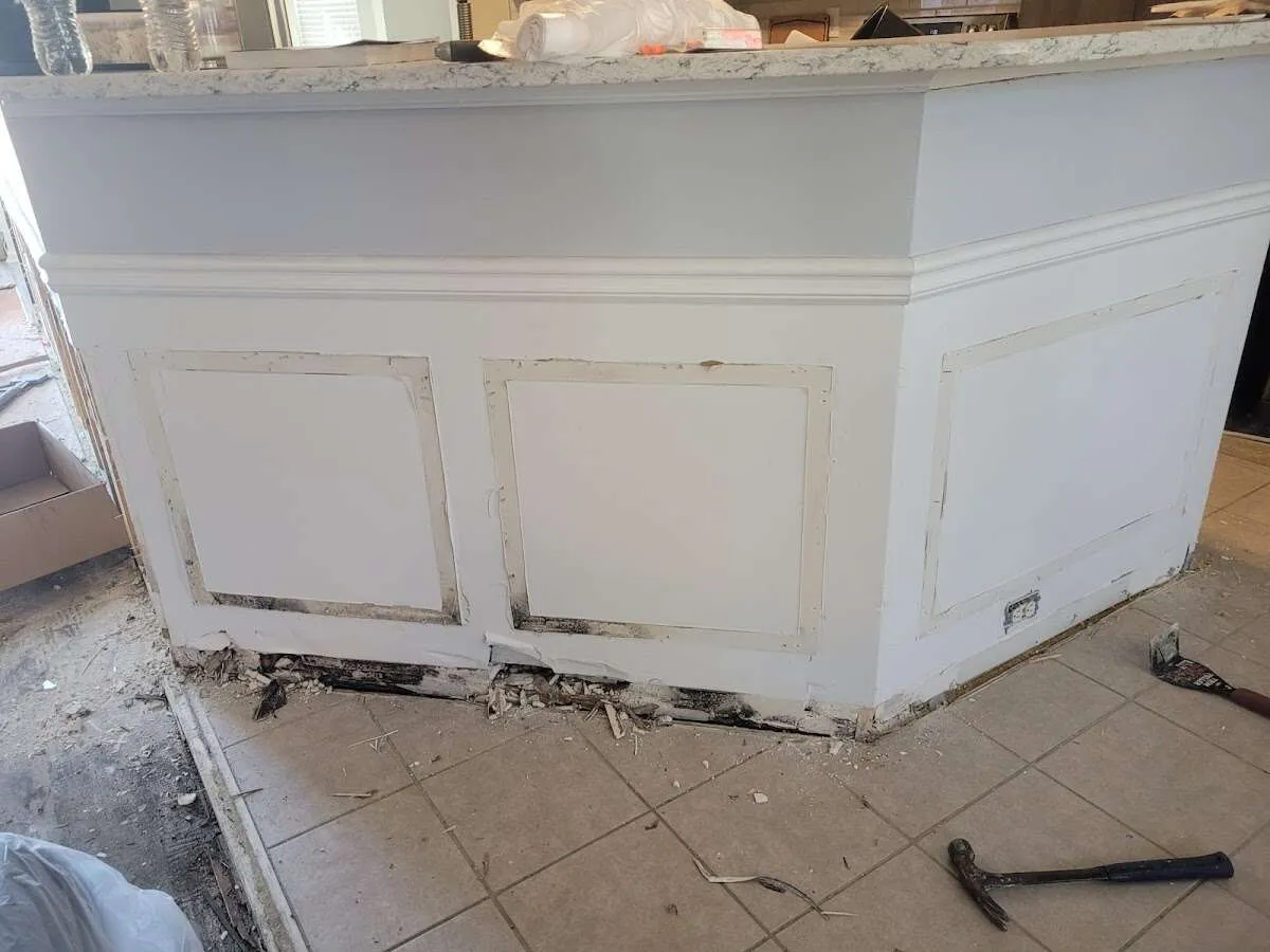 Water damage and mold on kitchen during Storm Damage Restoration in Forest Hill